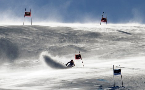 Marion Bertrand, of France, fights gusting winds as she speeds down the course during an alpine ski, women's World Cup giant slalom, in Soldeu-Grandvalira, Andorra, Sunday, Feb. 12, 2012. (AP Photo/Giovanni Auletta)