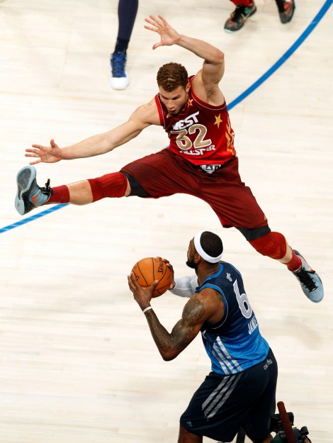 Western Conference's Blake Griffin (32), of the Los Angeles Clippers, jumps to block a pass by Eastern Conference's LeBron James (6), of the Miami Heat, during the NBA All-Star basketball game, Sunday, Feb. 26, 2012, in Orlando, Fla. The Western Conference won 152-149. (AP Photo/Lynne Sladky)