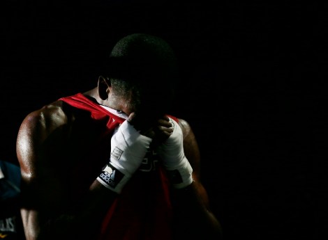 Jamel Herring, of the United States reacts after being defeated by Kazakhstan's Daniyar Yelessinov in their men's light welter 64-kg boxing match at the 2012 Summer Olympics, Tuesday, July 31, 2012, in London. (AP Photo/Ivan Sekretarev)