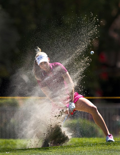 Ryan O'Toole hits from the bunker on the 10th hole during the second round of the LPGA Kraft Nabisco Championship golf tournament in Rancho Mirage, Calif., Friday, March 30, 2012. (AP Photo/Chris Carlson)