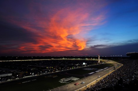 The sun sets behind clouds during the NASCAR Sprint Cup Series auto race at Atlanta Motor Speedway, Sunday, Sept. 2, 2012, in Hampton, Ga. (AP Photo/Rainier Ehrhardt)