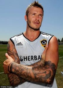 David Beckham e i suoi tatuaggi sulle braccia (Foto Getty Images)