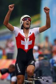 Arrivo a braccia alzate per Cancellara: è oro olimpico a Pechino 2008 (Photo Jeff Gross/Getty Images)